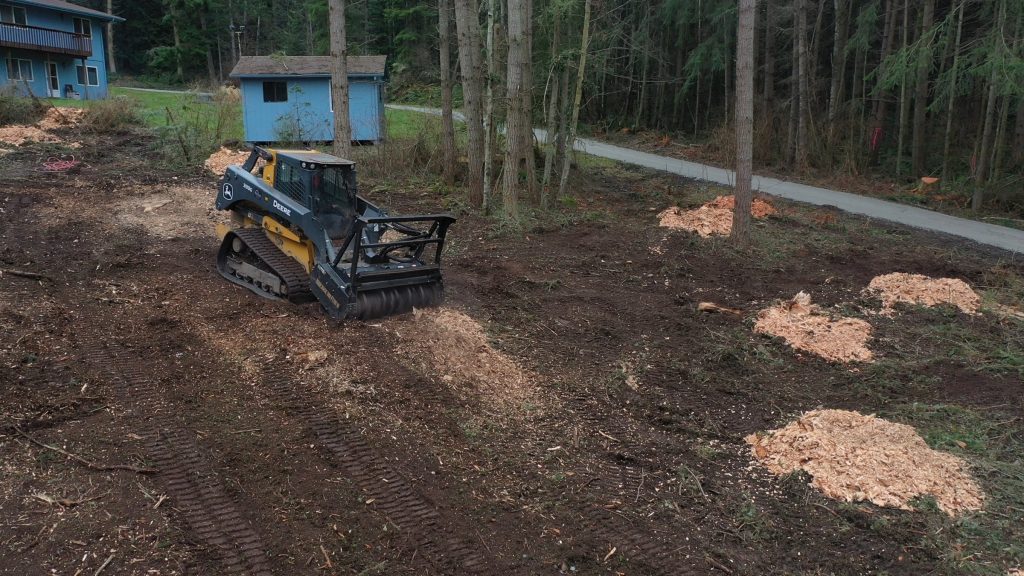 Forestry mulcher clearing a wooded lot